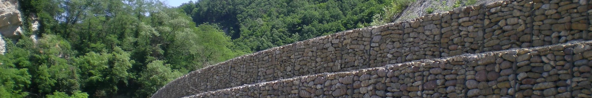 Gabion retaining wall installed on a roadside slope